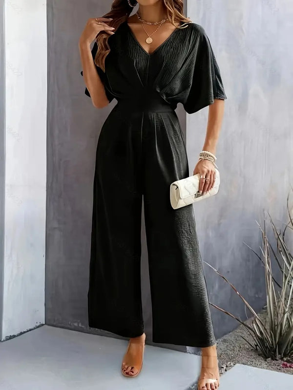 Jumpsuit för kvinnor | V-ringad och draperad design | lättviktspolyester för vår och sommar