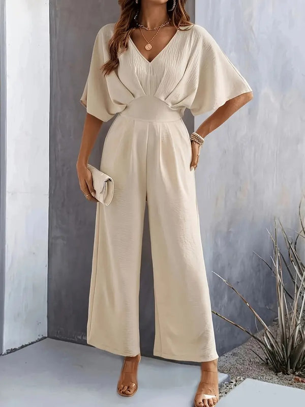 Dam Jumpsuit | V-ringning | Eleganta Rynkade Detaljer | Aprikos