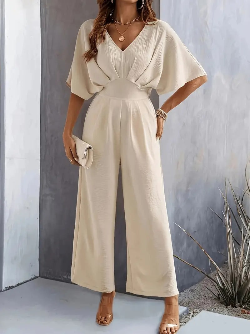 Dam Jumpsuit | V-ringning | Eleganta Rynkade Detaljer | Aprikos