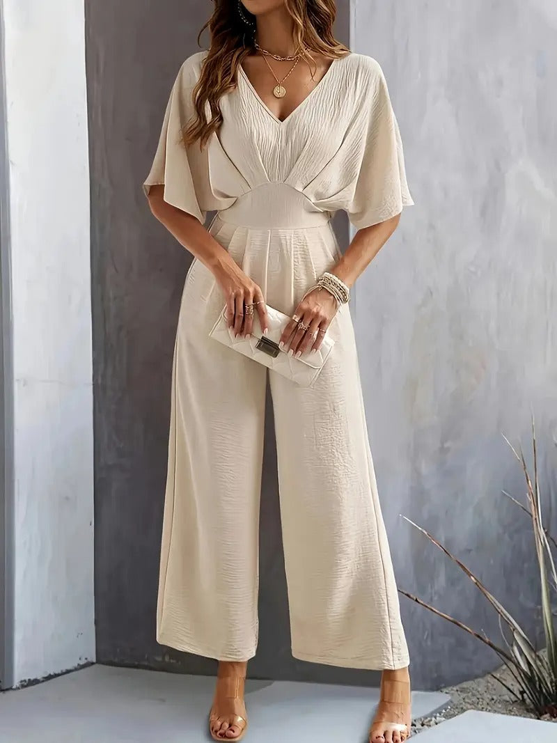 Dam Jumpsuit | V-ringning | Eleganta Rynkade Detaljer | Aprikos