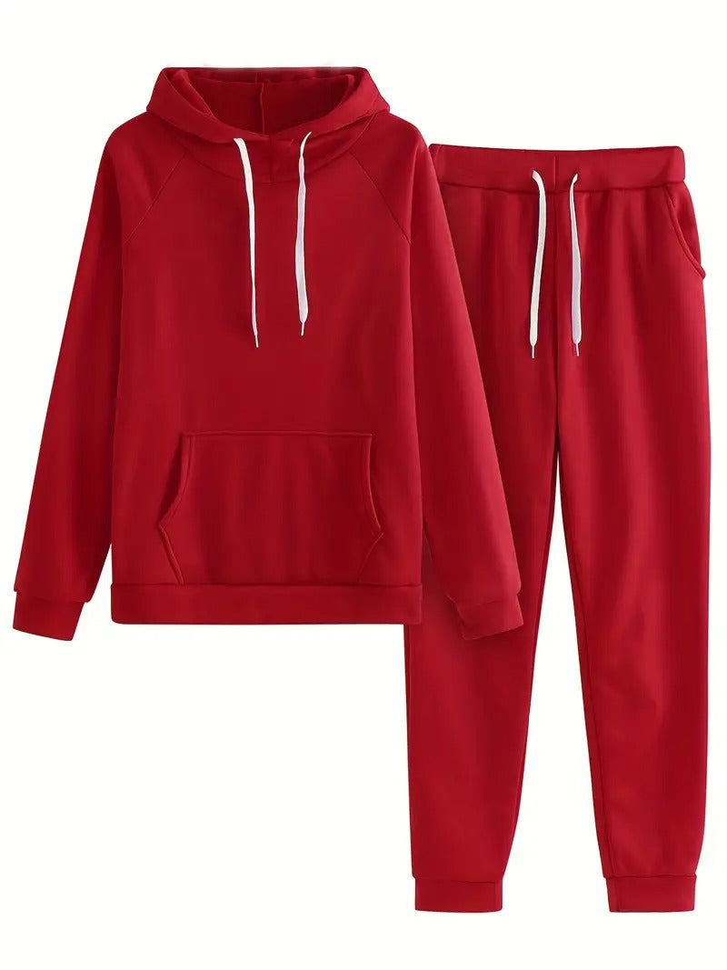 Träningsoverall för kvinnor | Set med huvtröja och byxor | enfärgad och med fickdetaljer | polyester