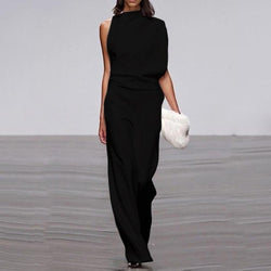 Rygglös plisserad jumpsuit | enfärgad & ärmlös | utsvängd passform med oregelbunden fåll