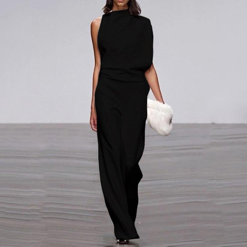 Rygglös plisserad jumpsuit | enfärgad & ärmlös | utsvängd passform med oregelbunden fåll