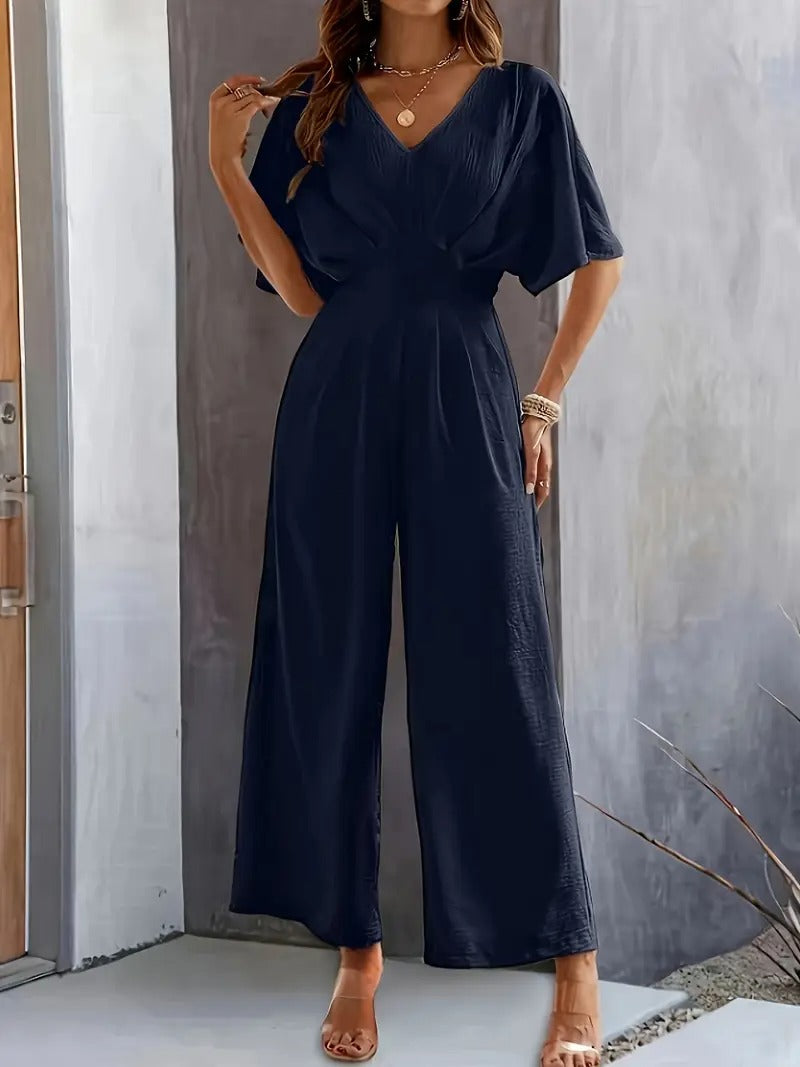 Jumpsuit för kvinnor | V-ringad och draperad design | lättviktspolyester för vår och sommar