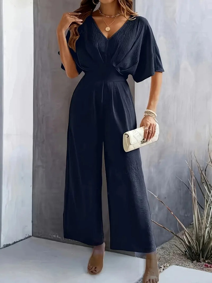 Jumpsuit för kvinnor | V-ringad och draperad design | lättviktspolyester för vår och sommar