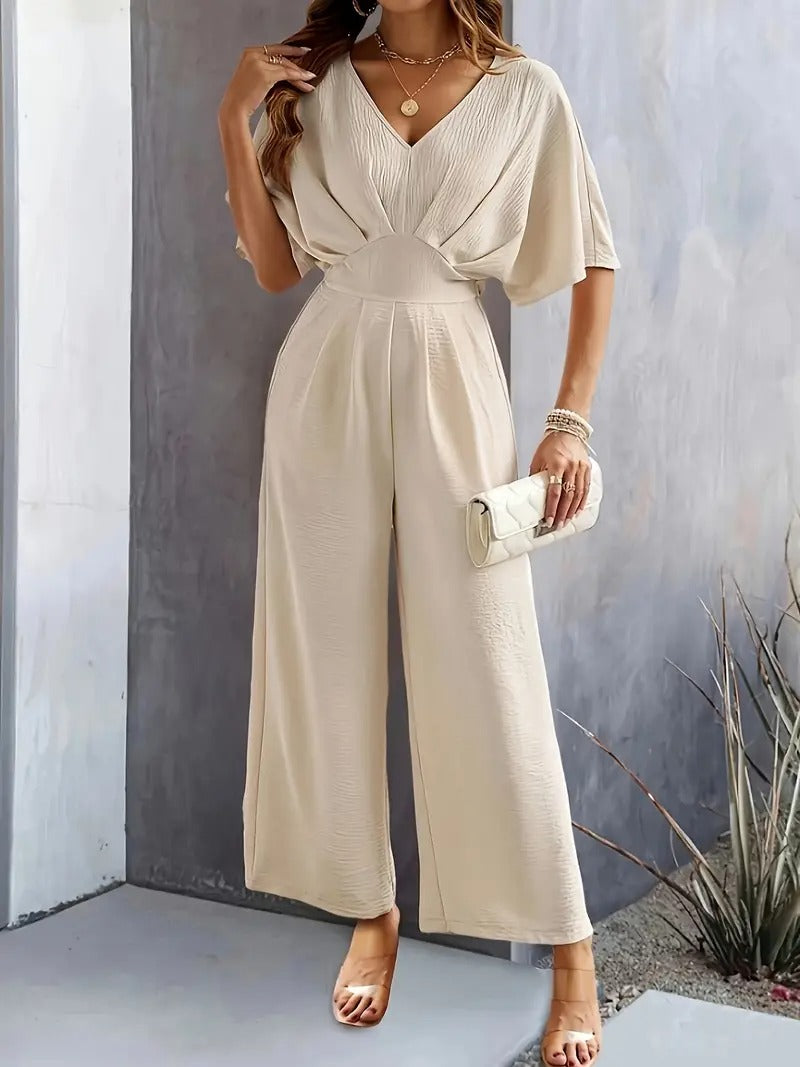 Dam Jumpsuit | V-ringning | Eleganta Rynkade Detaljer | Aprikos